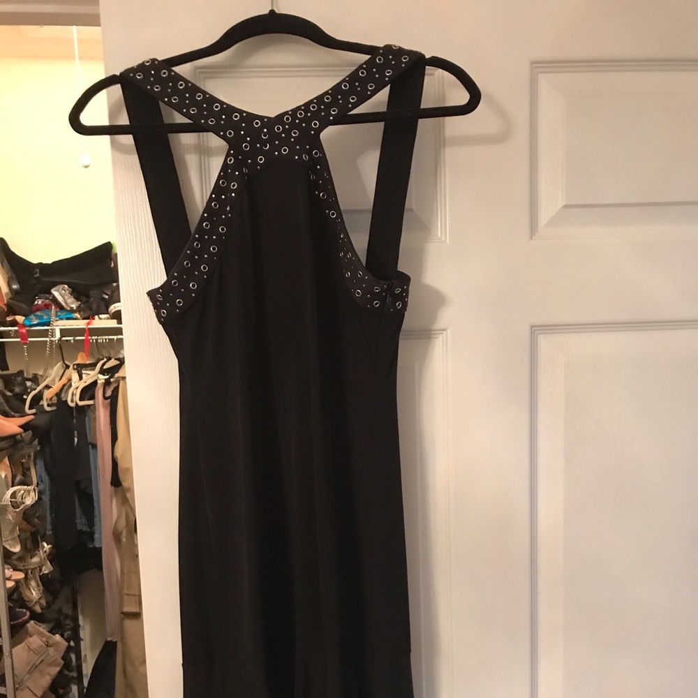 knee length black made from polyester and spandex